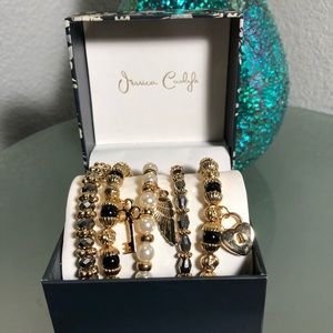 Jessica Carlyle bracelets with charms.